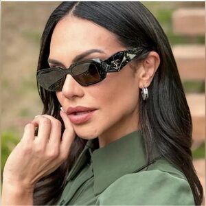 PRADA’S SEEN ON CELEBS AND INFLUENCERS, THIS STYLE IS AN UNIQUE BROWN MARBLEIZE